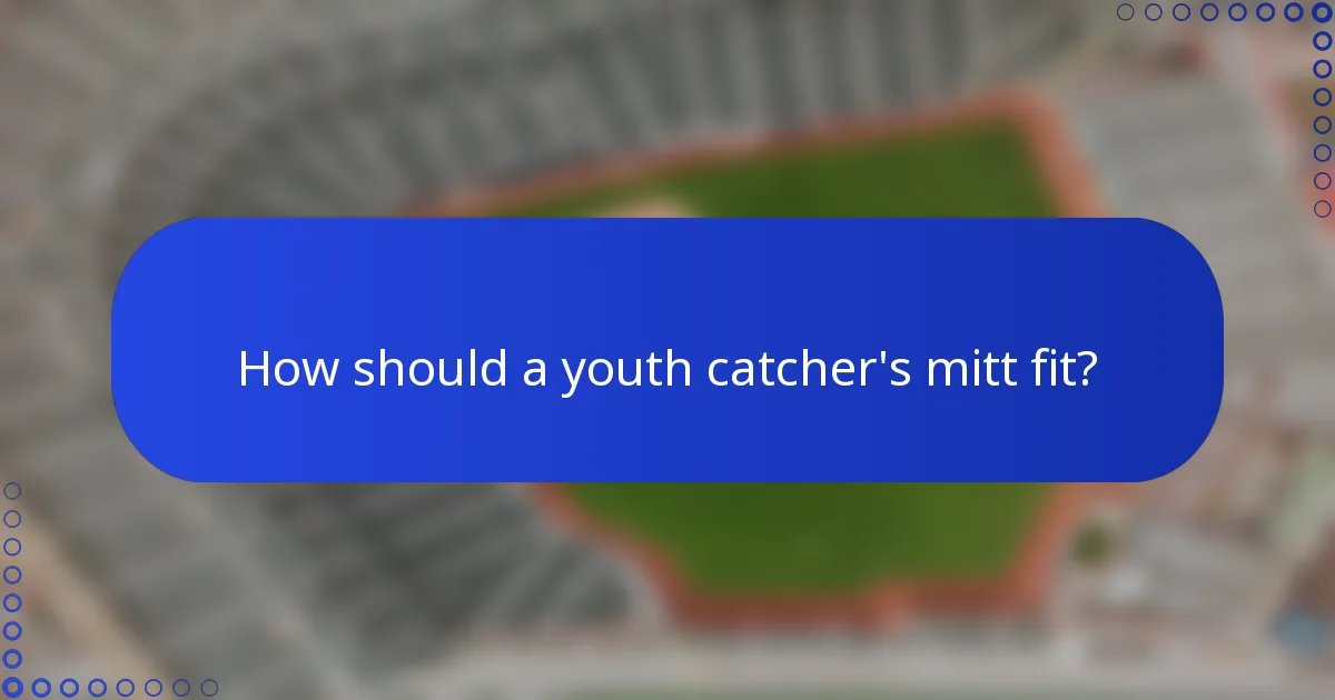 How should a youth catcher's mitt fit?