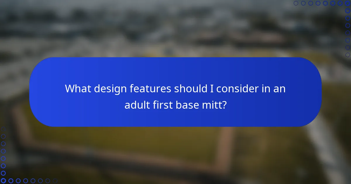 What design features should I consider in an adult first base mitt?