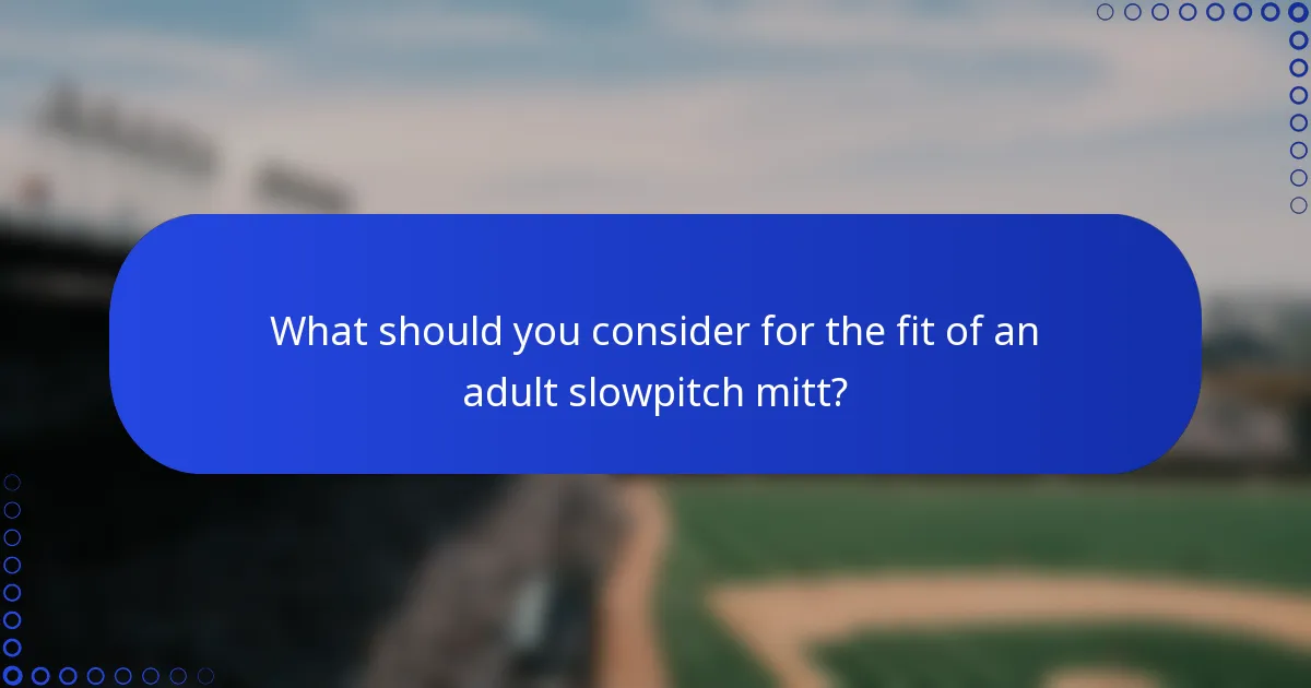 What should you consider for the fit of an adult slowpitch mitt?